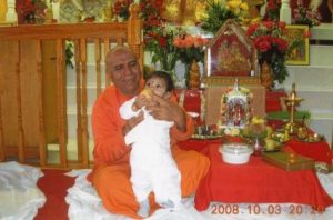 Hindu priest & Romi Gupta